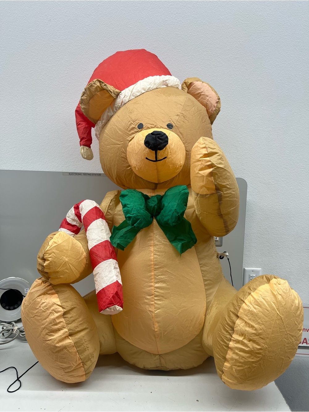 Holiday Teddy Bear Inflatable Decoration with Red Santa Hat and Green Bow